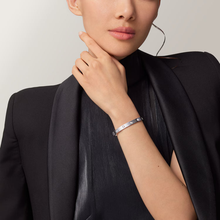 silver stainless steel white diamond bangle.